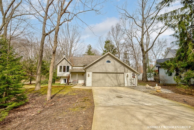 view of front facade featuring concrete driveway and an attached garage
