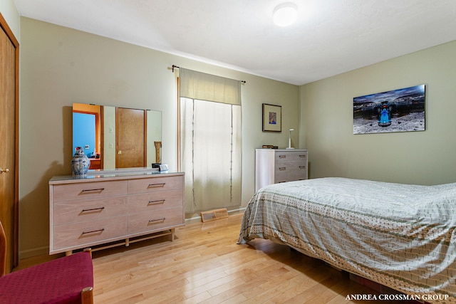 bedroom featuring light wood-style flooring