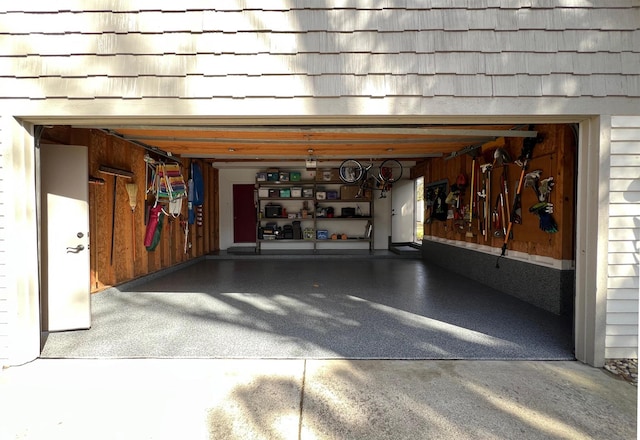 garage featuring driveway