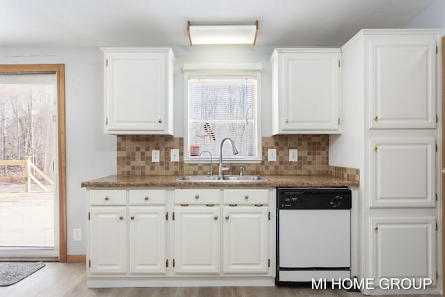 13879 49th St, Grand Junction, MI 49056 - kitchen featuring a sink, white cabinets, dishwasher, and tasteful backsplash