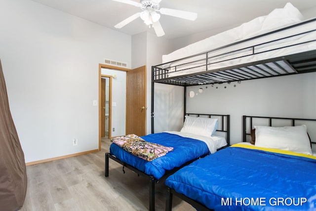 13879 49th St, Grand Junction, MI 49056 - bedroom featuring baseboards, visible vents, wood finished floors, and ceiling fan