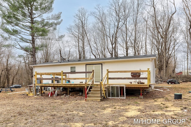 13879 49th St, Grand Junction, MI 49056 - back of house with a deck