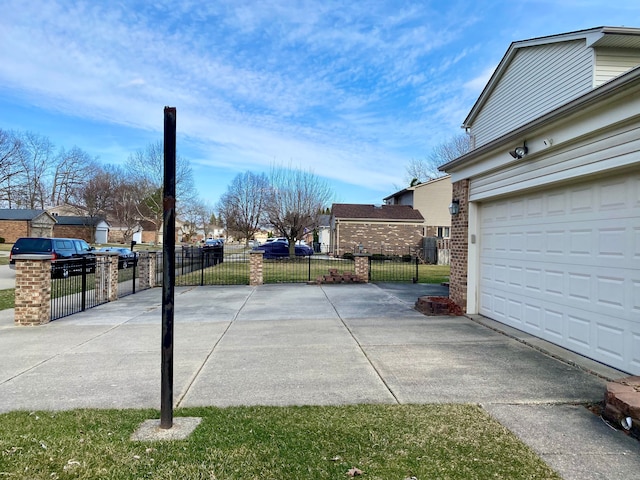 exterior space with a residential view and driveway