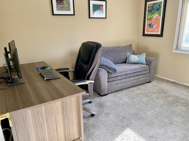 office space featuring baseboards and carpet