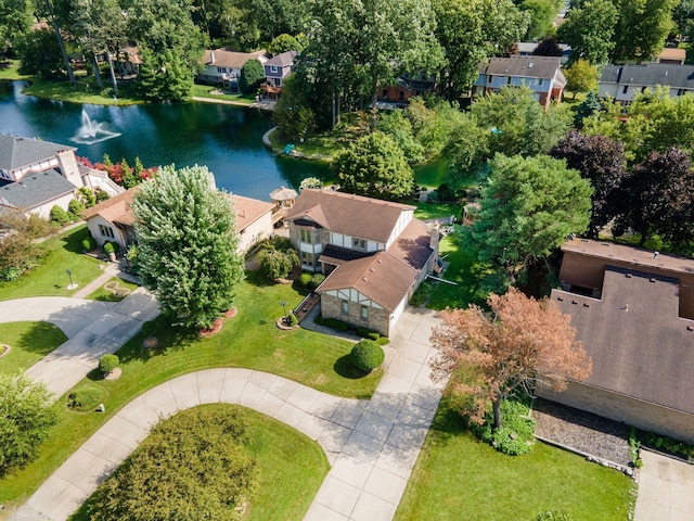 bird's eye view with a residential view and a water view