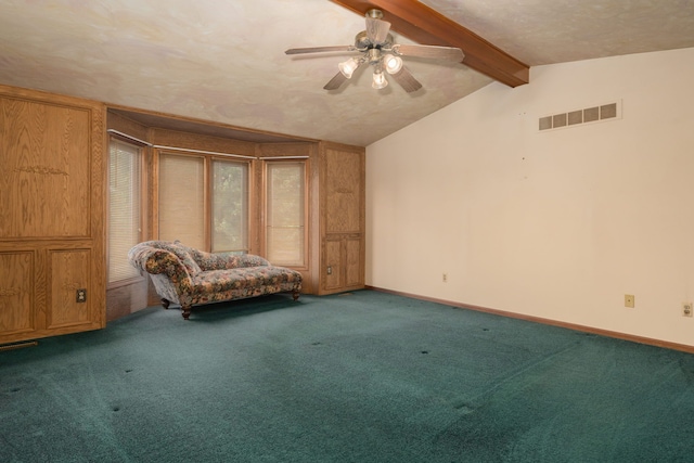 sitting room with vaulted ceiling with beams, a ceiling fan, carpet flooring, and visible vents