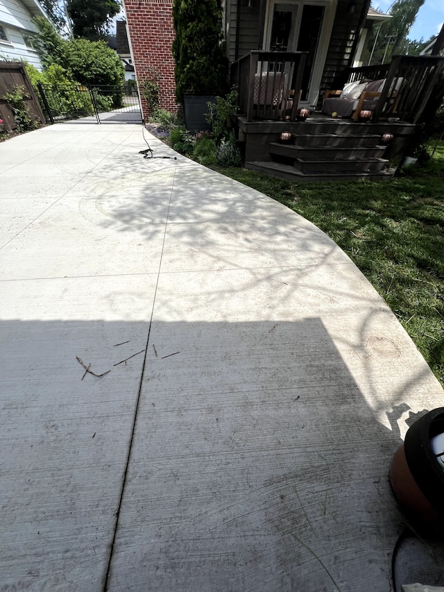 view of patio / terrace featuring fence and a wooden deck