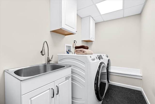 423 Heights Rd, Lake Orion, MI 48362 - laundry area featuring cabinet space, separate washer and dryer, and baseboards