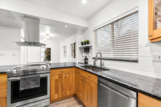 423 Heights Rd, Lake Orion, MI 48362 - kitchen with appliances with stainless steel finishes, island exhaust hood, a sink, decorative backsplash, and dark stone countertops