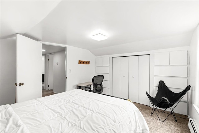 423 Heights Rd, Lake Orion, MI 48362 - bedroom with baseboard heating, carpet floors, vaulted ceiling, and a closet