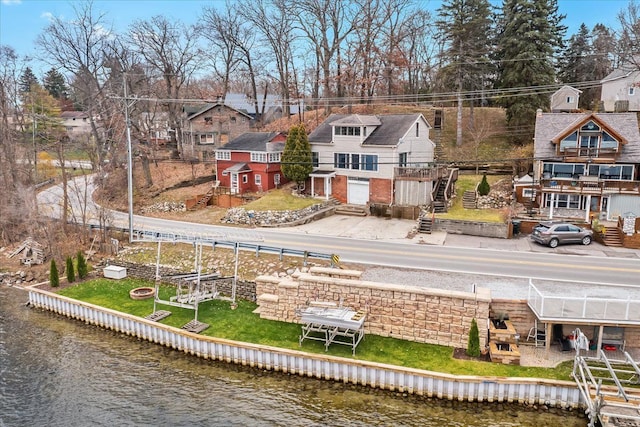 423 Heights Rd, Lake Orion, MI 48362 - aerial perspective of suburban area featuring a nearby body of water