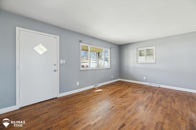 3738 Holly Ave, Flint, MI 48506 - foyer with wood finished floors and baseboards