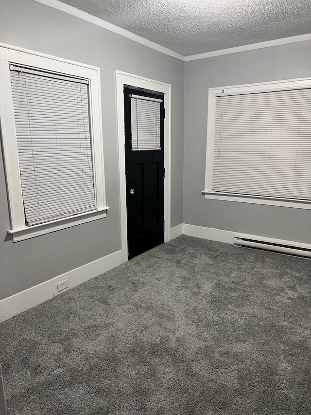8451 La Salle Blvd, Detroit, MI 48206 - carpeted spare room featuring baseboards, baseboard heating, and a textured ceiling