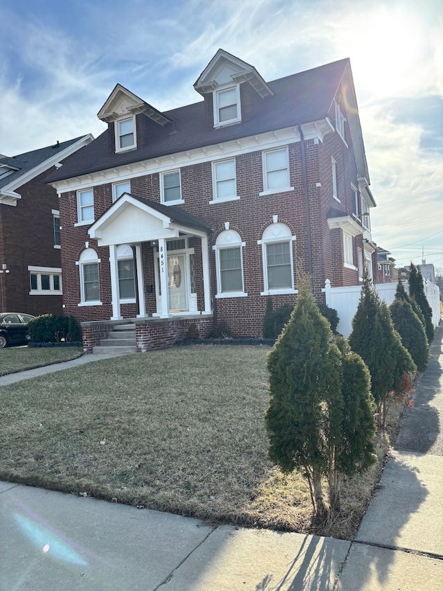 8451 La Salle Blvd, Detroit, MI 48206 - view of front of property with brick siding and a front lawn