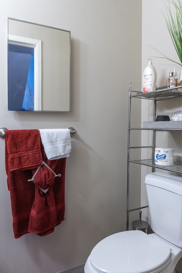 bathroom featuring toilet