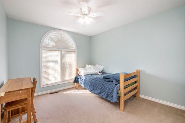 1615 Royal Birkdale Dr, Oxford, MI 48371 - carpeted bedroom featuring baseboards, ceiling fan, and visible vents