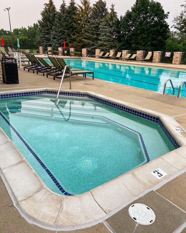 1615 Royal Birkdale Dr, Oxford, MI 48371 - pool featuring a patio area
