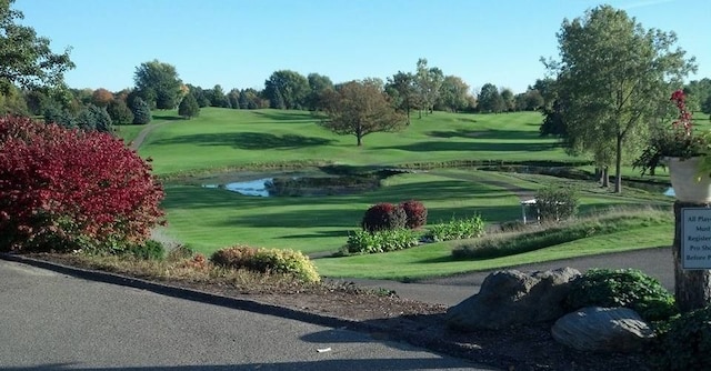 1615 Royal Birkdale Dr, Oxford, MI 48371 - view of home's community featuring view of golf course and a lawn