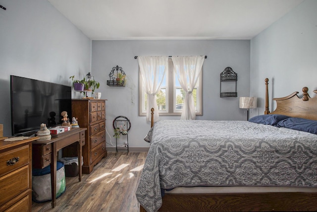 771 Q Dr S, Fulton, MI 49052 - bedroom with wood finished floors and baseboards