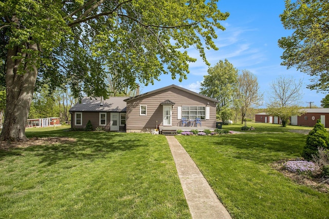 771 Q Dr S, Fulton, MI 49052 - view of front of home with a front lawn