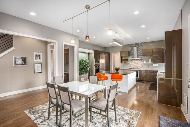 1686 Traceky, Rochester Hills, MI 48306 - dining space featuring hardwood / wood-style floors, baseboards, and recessed lighting