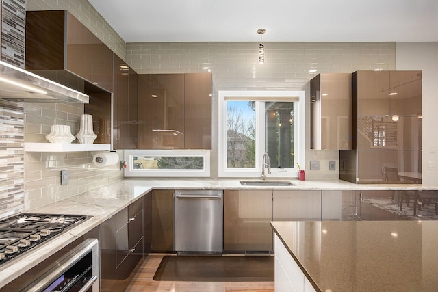 1686 Traceky, Rochester Hills, MI 48306 - kitchen with wall chimney exhaust hood, appliances with stainless steel finishes, a sink, and decorative backsplash