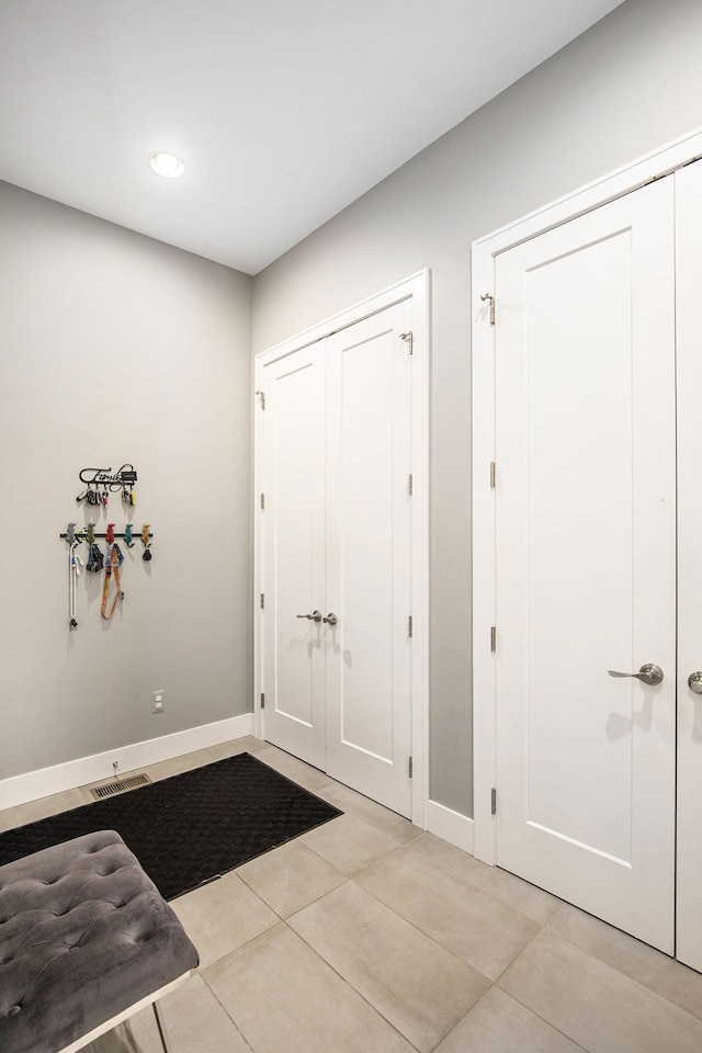 1686 Traceky, Rochester Hills, MI 48306 - foyer entrance with light tile patterned flooring, baseboards, and recessed lighting