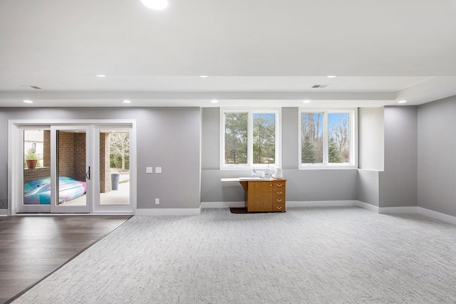 1686 Traceky, Rochester Hills, MI 48306 - unfurnished living room with recessed lighting and baseboards