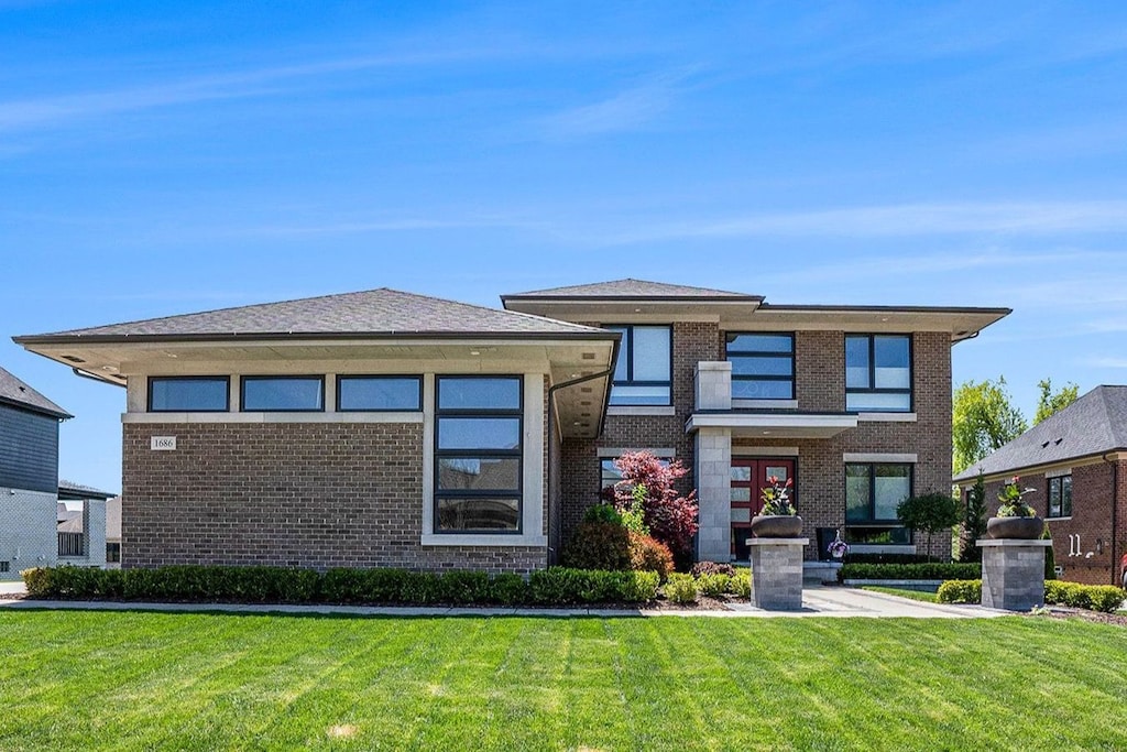 1686 Traceky, Rochester Hills, MI 48306 - prairie-style home with brick siding and a front yard