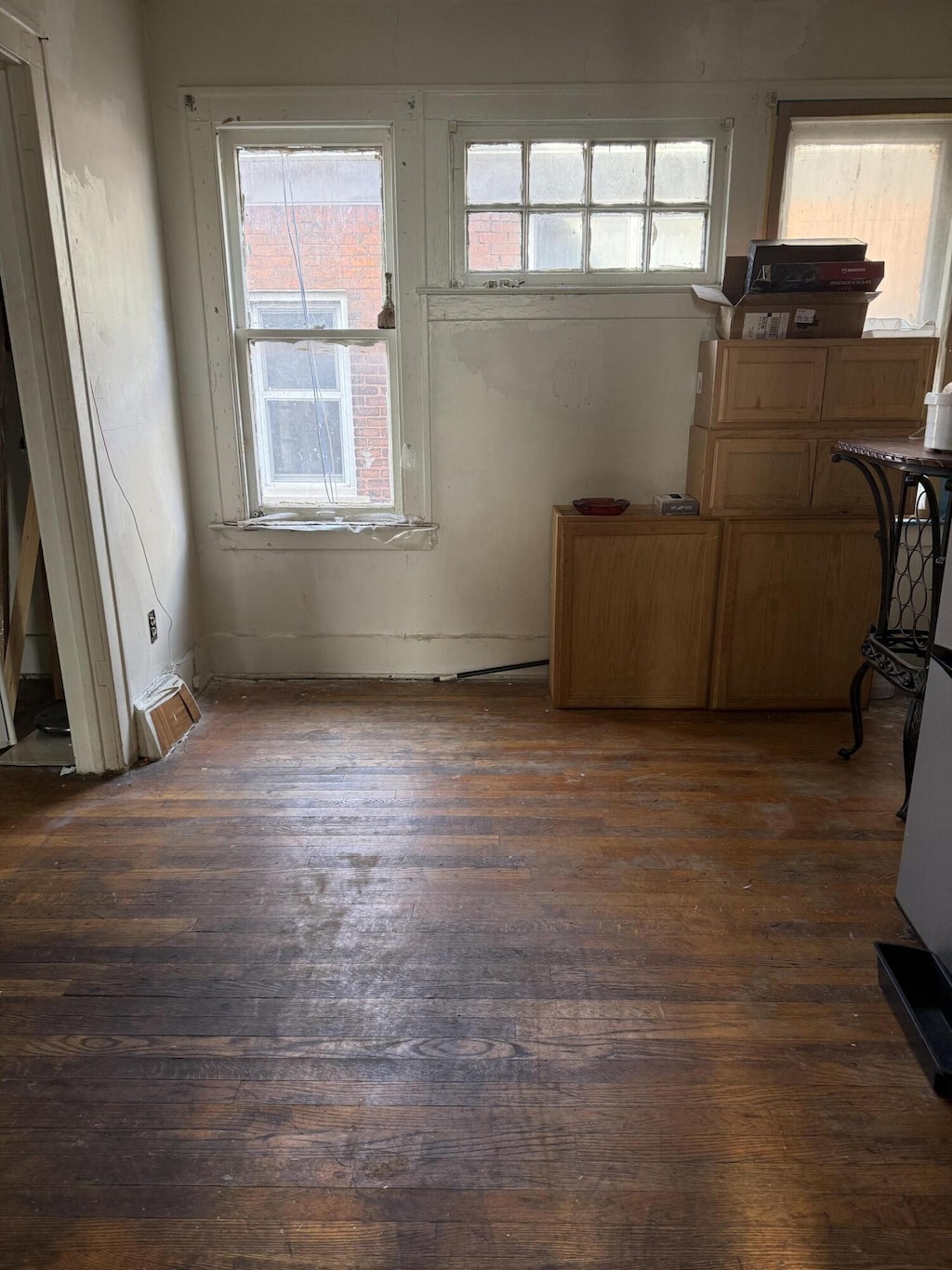 bedroom featuring dark wood-style flooring