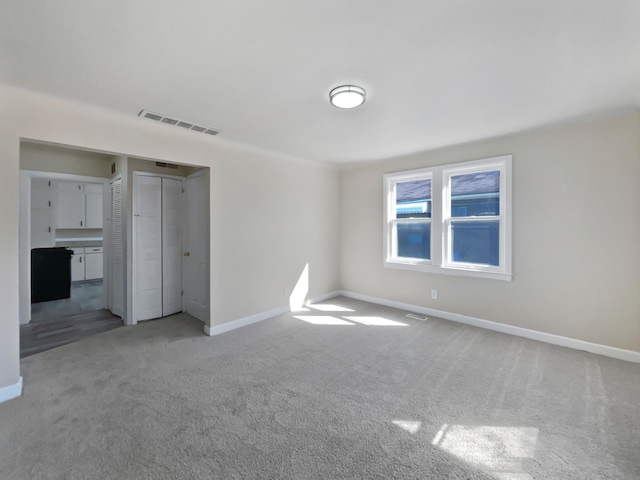 1927 Jarvis Ave, Warren, MI 48091 - unfurnished bedroom with light carpet and baseboards