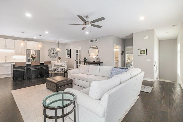 616 Boardwalk Ln Unit 24, Dexter, MI 48130 - living room with recessed lighting, baseboards, dark wood finished floors, visible vents, and a ceiling fan