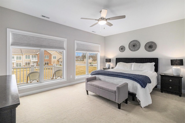 616 Boardwalk Ln Unit 24, Dexter, MI 48130 - bedroom featuring carpet flooring, ceiling fan, and visible vents