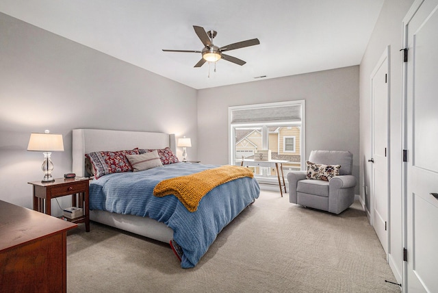 616 Boardwalk Ln Unit 24, Dexter, MI 48130 - bedroom with ceiling fan, visible vents, and light carpet