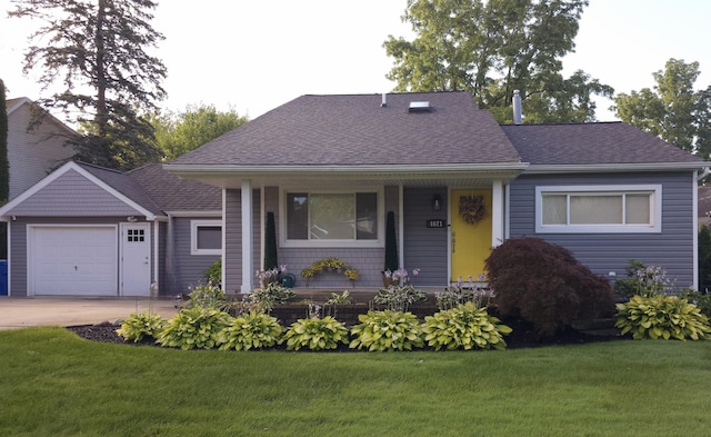 view of front of property with an attached garage, a front yard, roof with shingles, driveway, and a porch