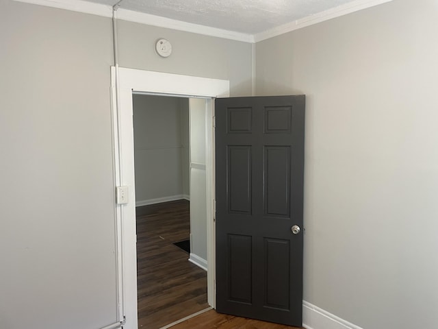 1776 Mcilwrath St, Muskegon, MI 49442 - unfurnished room featuring wood finished floors, a smoke detector, baseboards, and crown molding