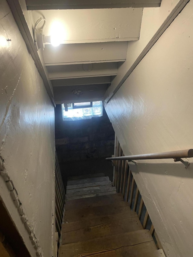 1776 Mcilwrath St, Muskegon, MI 49442 - stairs featuring wood finished floors