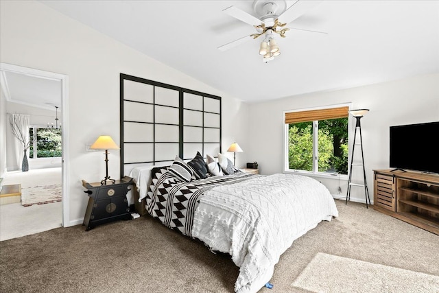 2865 Steeple Hill Rd, White Lake, MI 48383 - carpeted bedroom with multiple windows, vaulted ceiling, ceiling fan, and baseboards