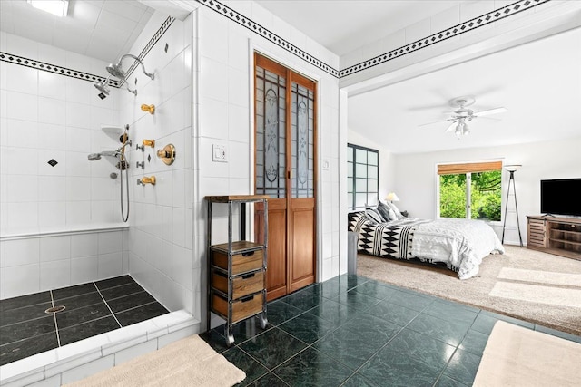2865 Steeple Hill Rd, White Lake, MI 48383 - ensuite bathroom featuring tiled shower, a ceiling fan, and tile patterned floors