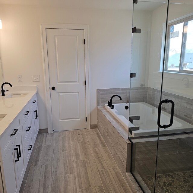 55834 Stewart Dr, Macomb, MI 48042 - full bath with a garden tub, double vanity, and a shower stall