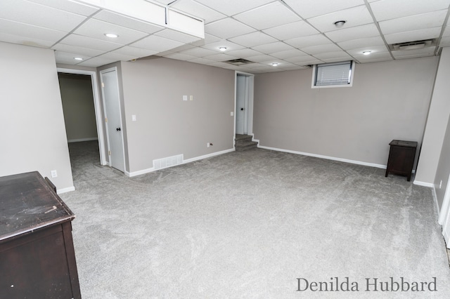 11724 N Satterlee Rd, Lakeview, MI 48850 - finished below grade area with a drop ceiling, carpet, and baseboards