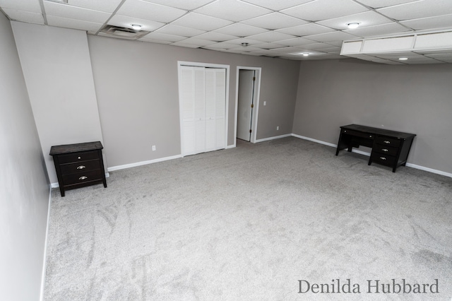 11724 N Satterlee Rd, Lakeview, MI 48850 - finished below grade area featuring carpet flooring, a drop ceiling, and baseboards