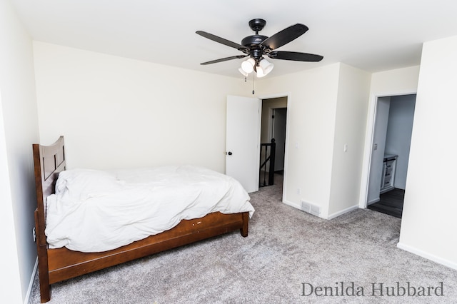 11724 N Satterlee Rd, Lakeview, MI 48850 - bedroom with carpet, baseboards, and ceiling fan