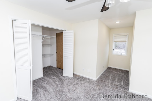 11724 N Satterlee Rd, Lakeview, MI 48850 - unfurnished bedroom featuring carpet floors, a closet, baseboards, and a ceiling fan