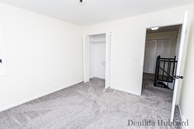 11724 N Satterlee Rd, Lakeview, MI 48850 - unfurnished bedroom featuring carpet flooring, baseboards, and a closet