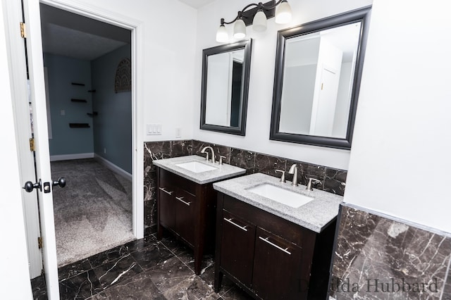 11724 N Satterlee Rd, Lakeview, MI 48850 - bathroom with two vanities and marble finish flooring
