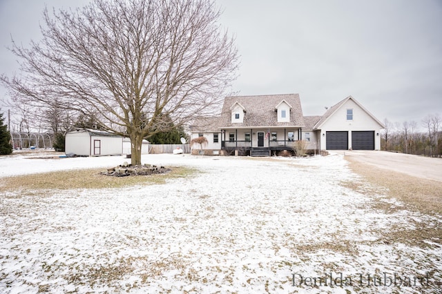 11724 N Satterlee Rd, Lakeview, MI 48850 - cape cod-style house featuring a porch and a garage