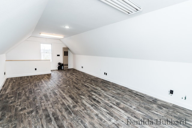 11724 N Satterlee Rd, Lakeview, MI 48850 - additional living space with wood finished floors, lofted ceiling, and baseboards