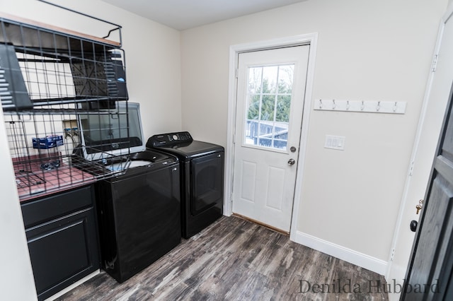 11724 N Satterlee Rd, Lakeview, MI 48850 - laundry area with separate washer and dryer, dark wood-style floors, and baseboards