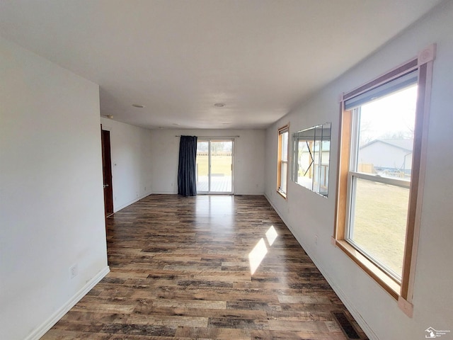 3023 W Stein Rd, La Salle, MI 48145 - spare room with baseboards, visible vents, and wood finished floors